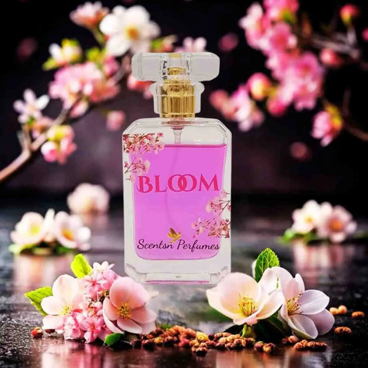 ScentsnPerfumes Bloom fragrance bottle with floral design and clear glass, showcasing the elegant perfume container.